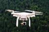 white drone-c-Jason Blackeye Unsplash